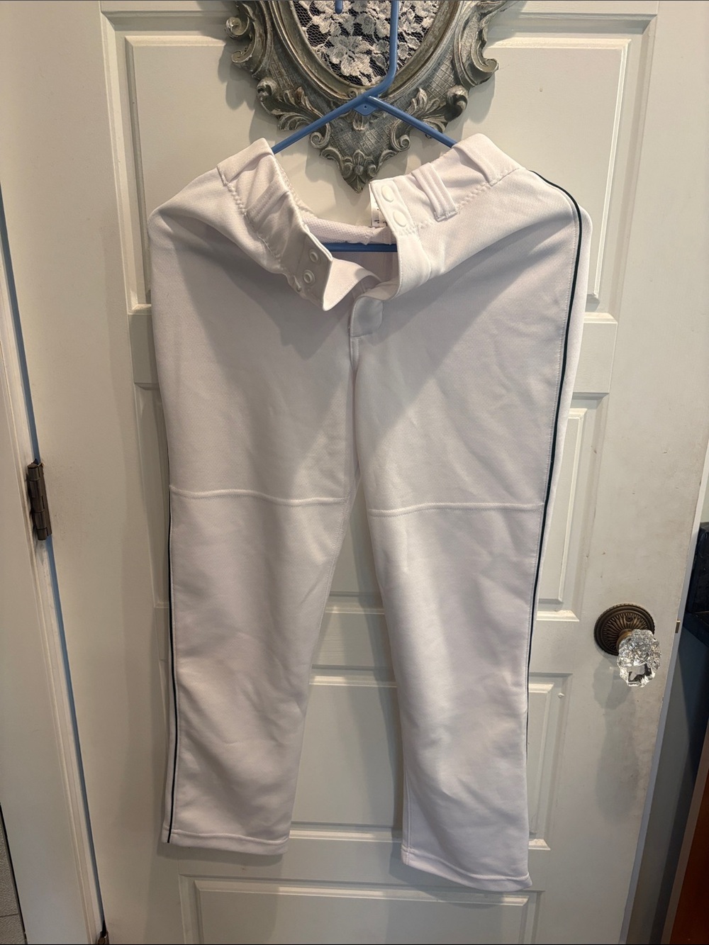 Majestic White baseball pants with green pinstripe